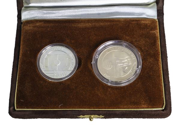 Diptych of legal tender silver coins commemorating the football world championships