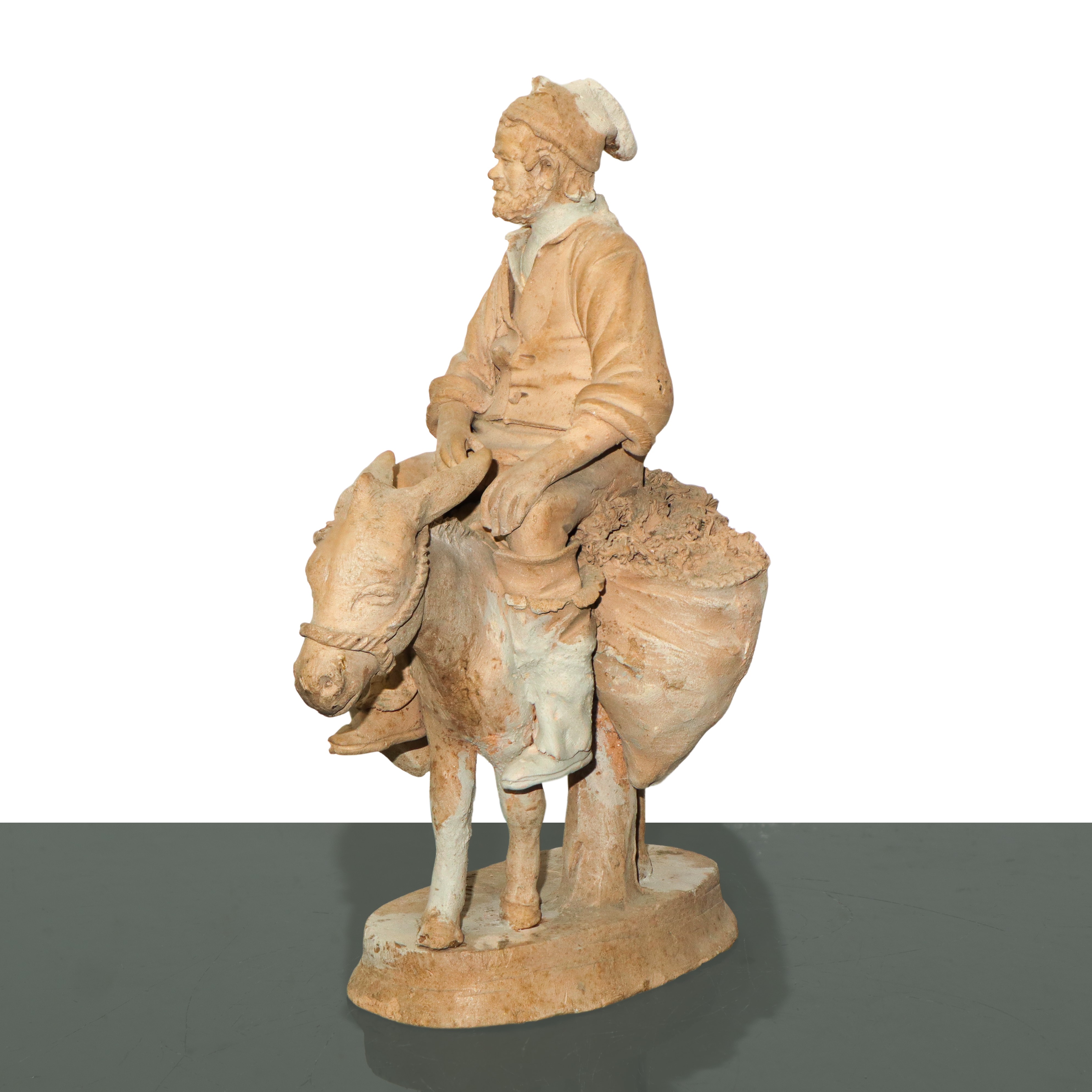 Contadino su mulo con cesto di frutta