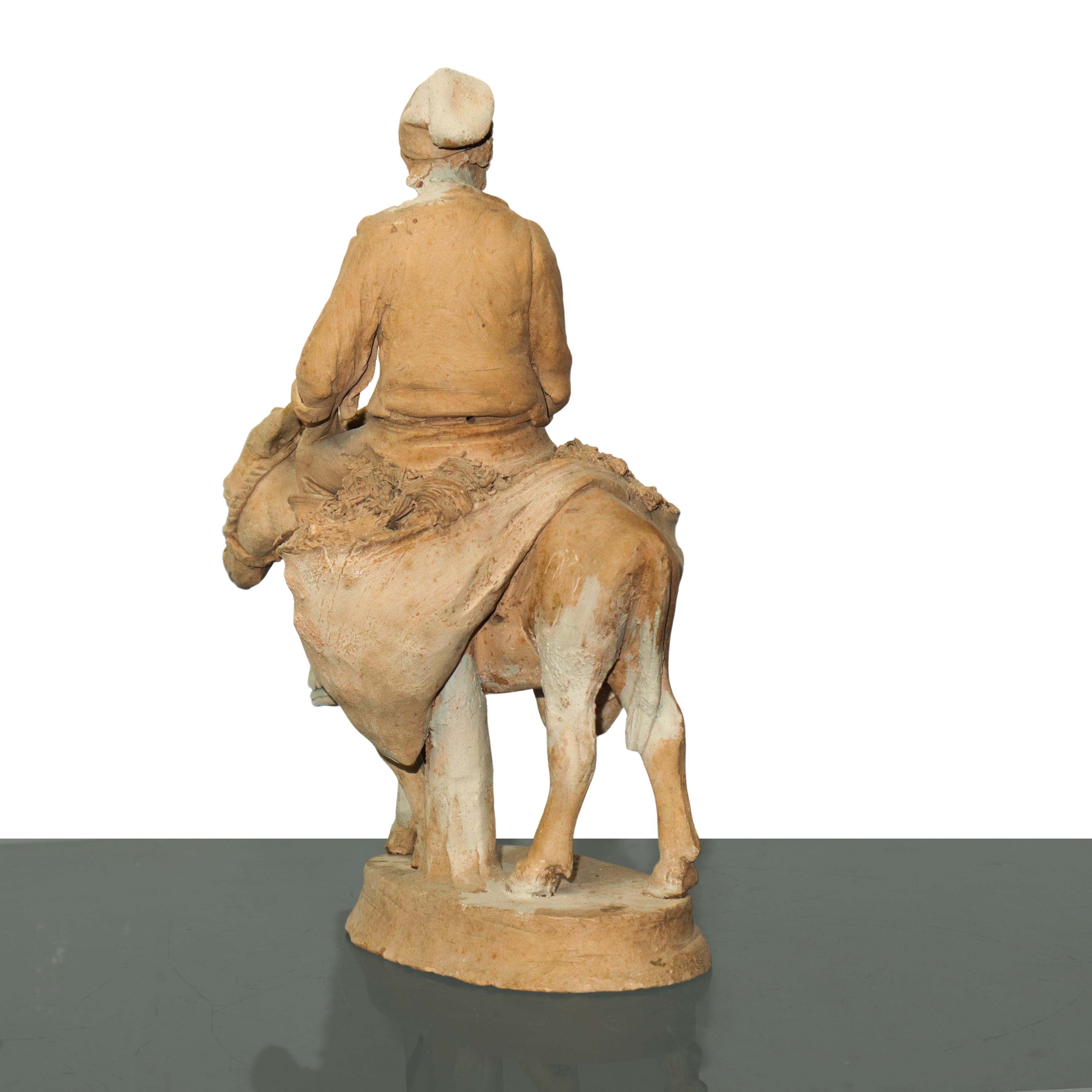 Contadino su mulo con cesto di frutta