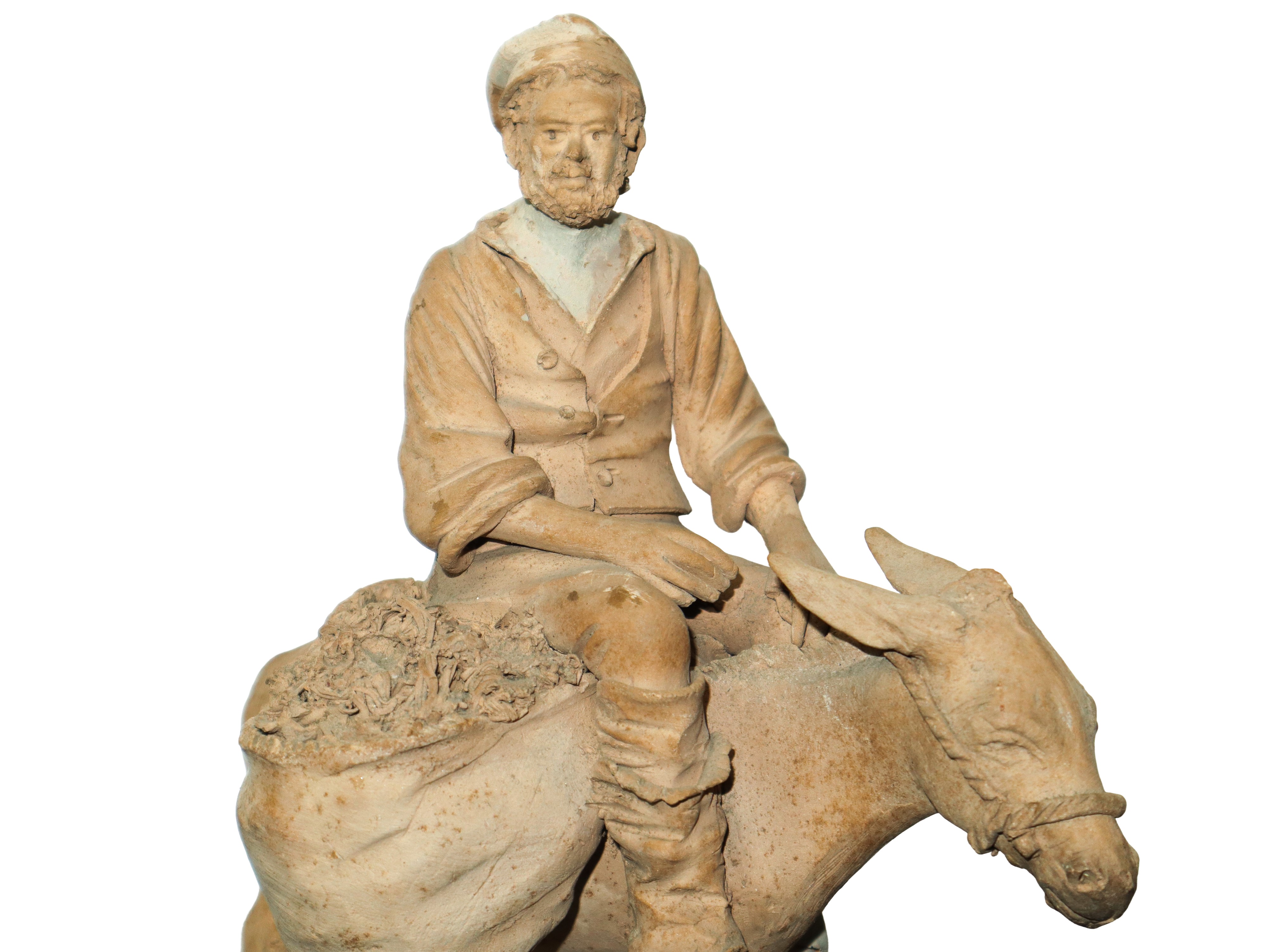 Contadino su mulo con cesto di frutta