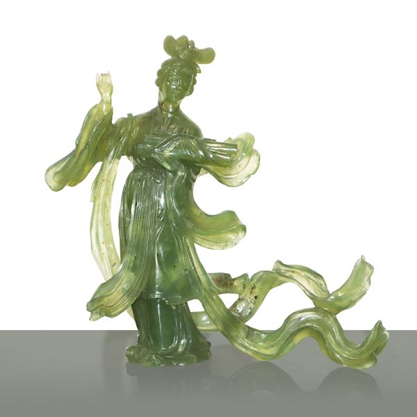 Guanyn in green jade