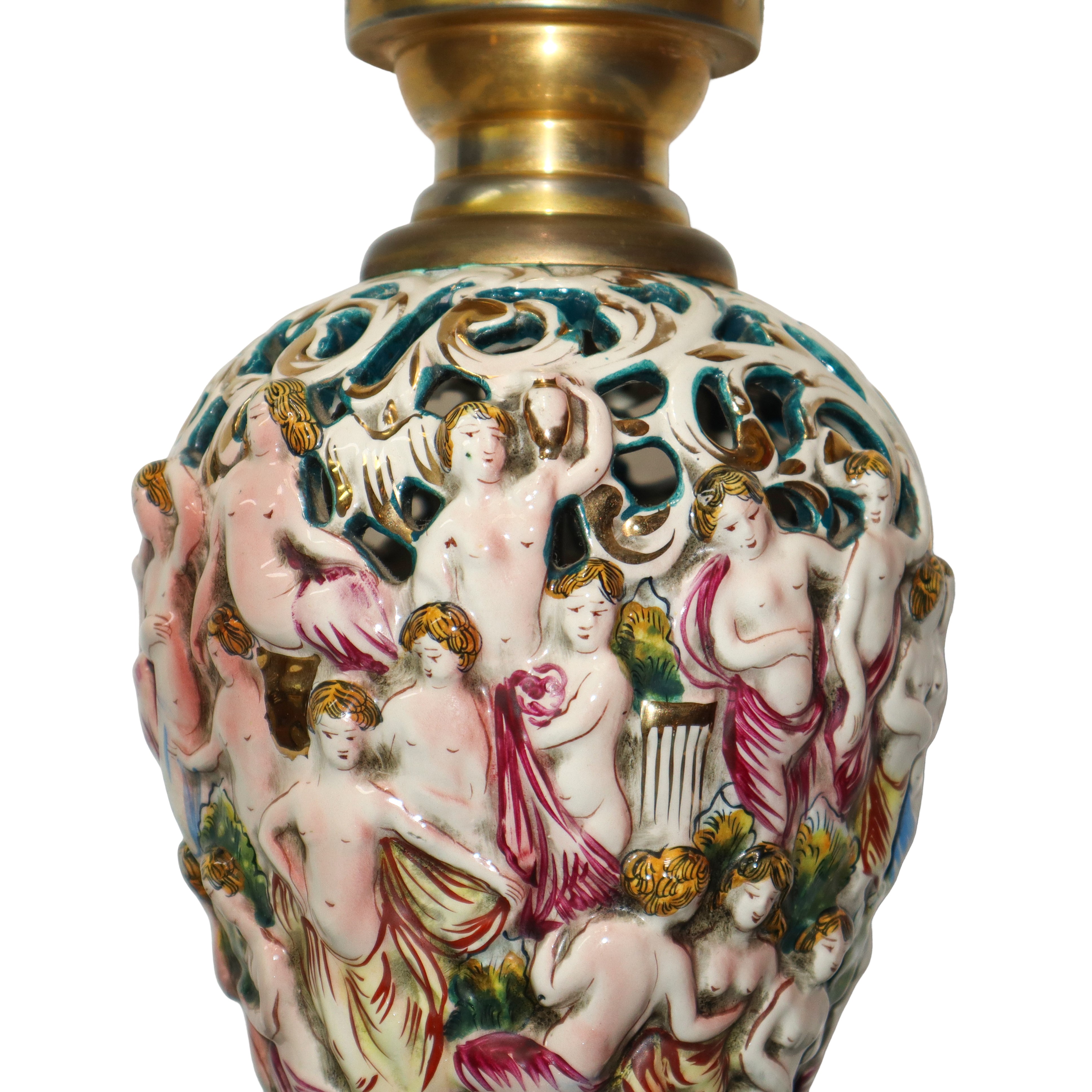 Lume con base in porcellana e boccia a palla in vetro