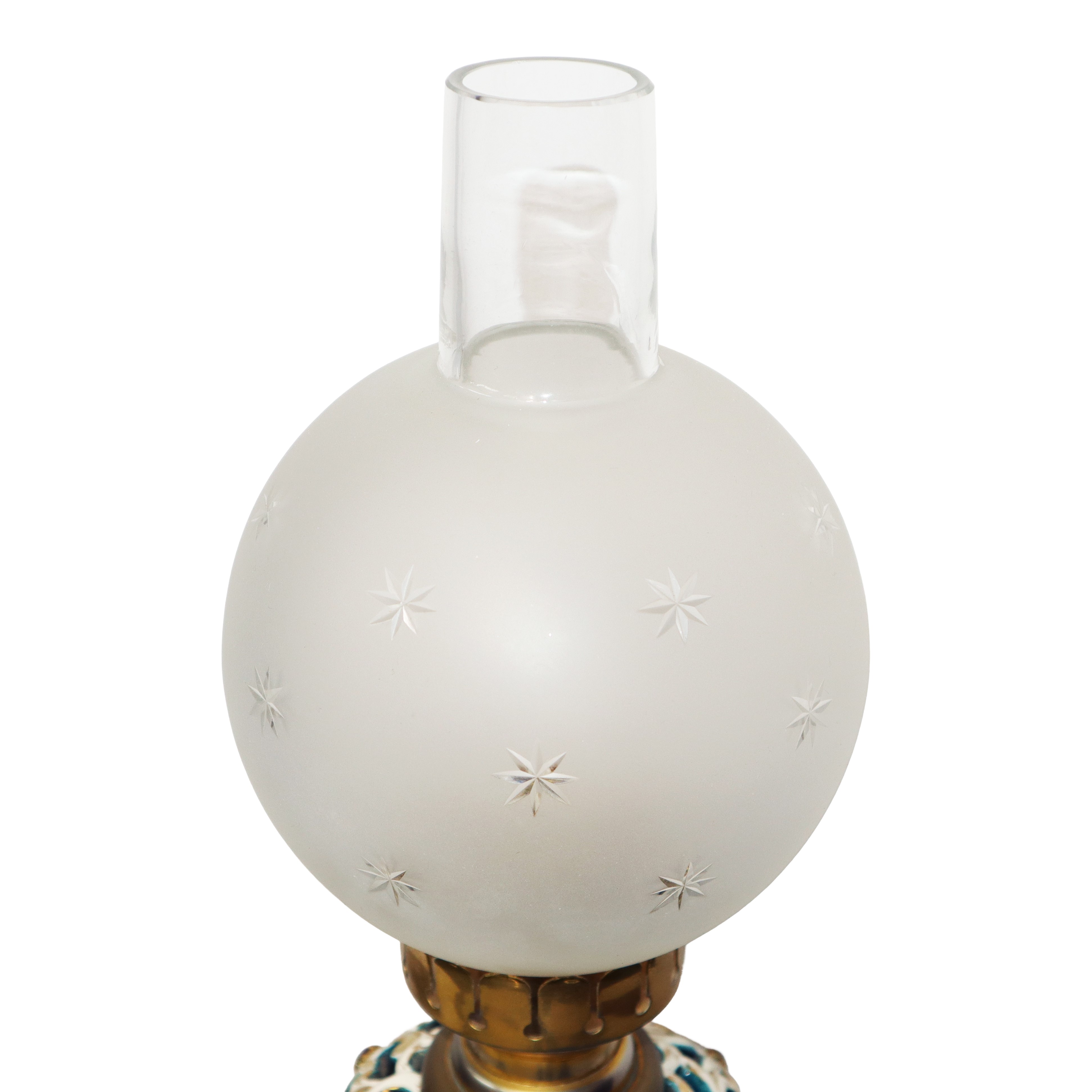 Lume con base in porcellana e boccia a palla in vetro