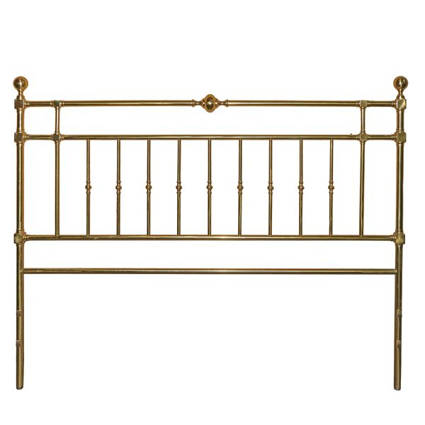 Letto in metallo dorato