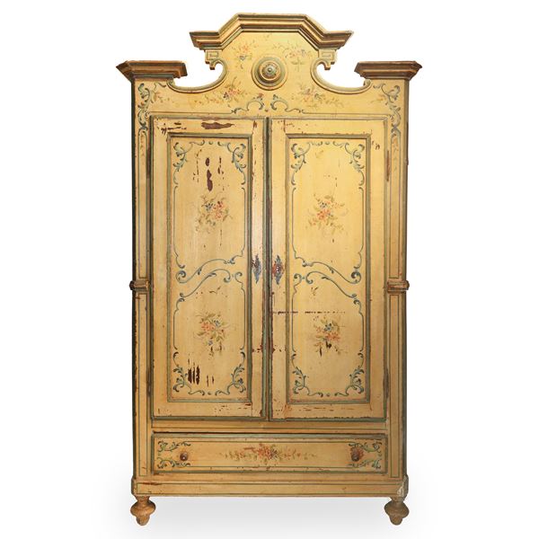 Large lacquered and painted wardrobe with floral motifs 