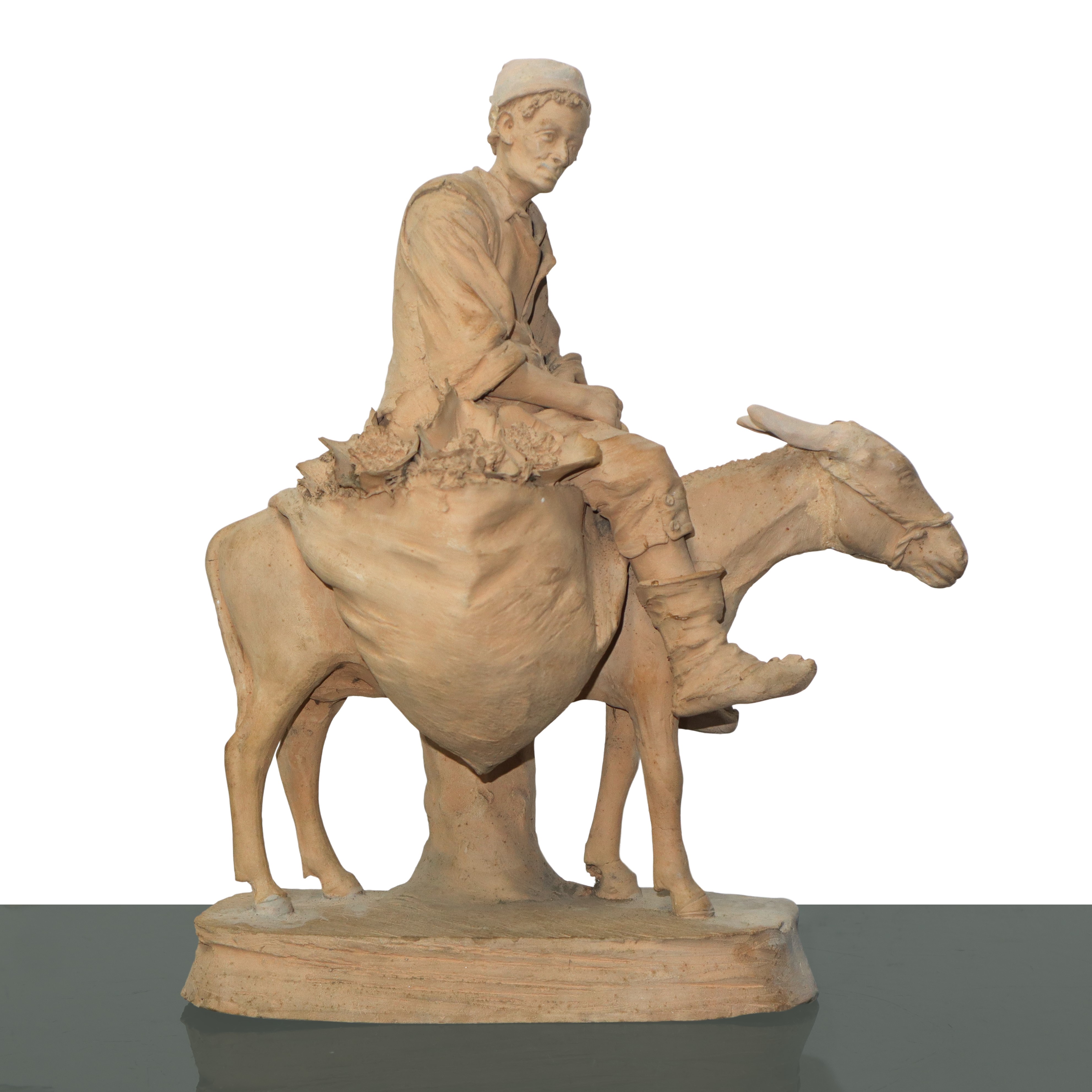 Contadino su un mulo, figura in terracotta