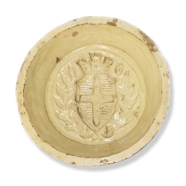 Caltagirone oval majolica tile depicting the city's coat of arms