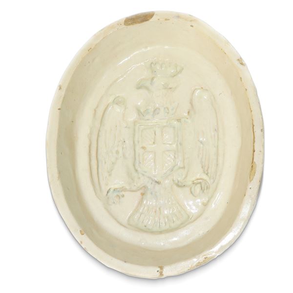 Oval tile in Caltagirone majolica with the city's coat of arms