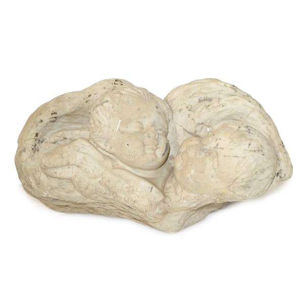 Heads of putti, marble fragment