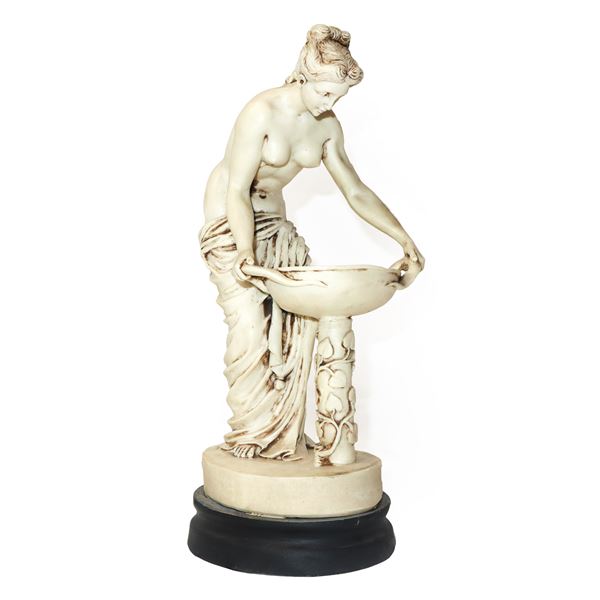 Hestia, small sculpture made from a mold on a wooden base