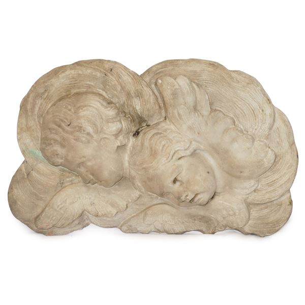 Frieze with pair of zephyrs, white marble fragment