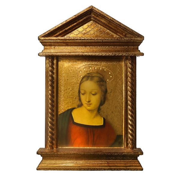 Detail of the Madonna del Cardellino in a gilded wooden aedicule