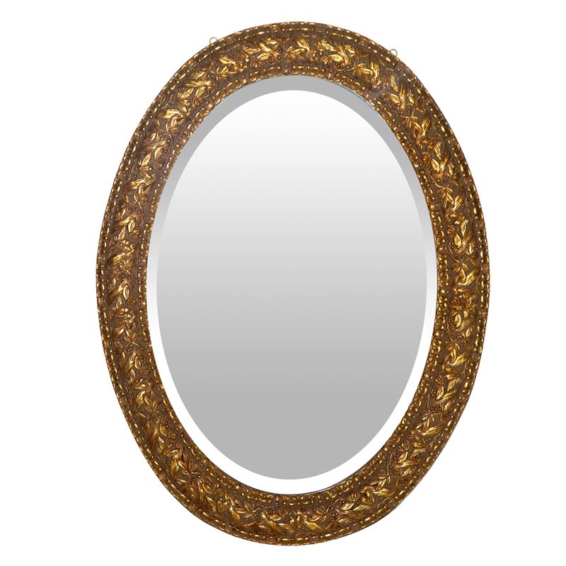 Specchiera ovale entro cornice dorata decorata con motivi vegetali e nastro