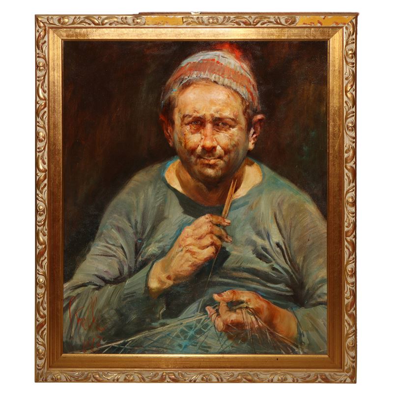 Pescatore che rimaglia la rete