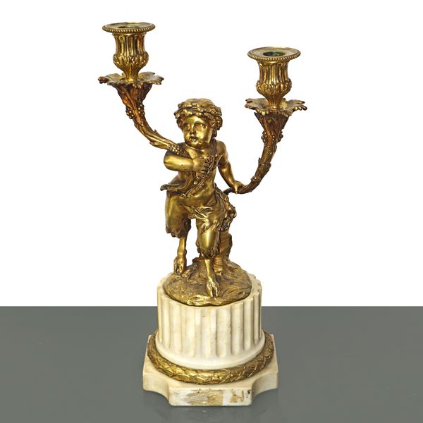 Two-light gilded bronze candle holder with marble base
