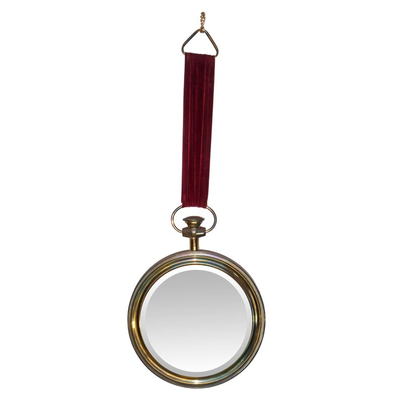 Specchiera tonda entro cornice oro pendente con nastro in velluto rosso