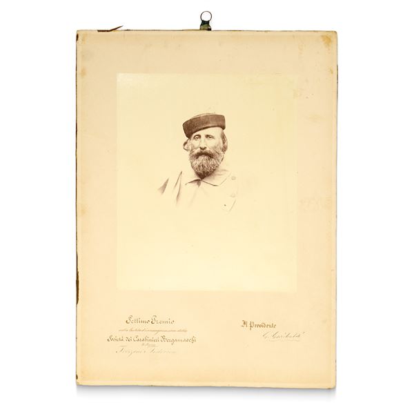 Honorary diploma with autograph signature of Giuseppe Garibaldi placed on a photo of the same
