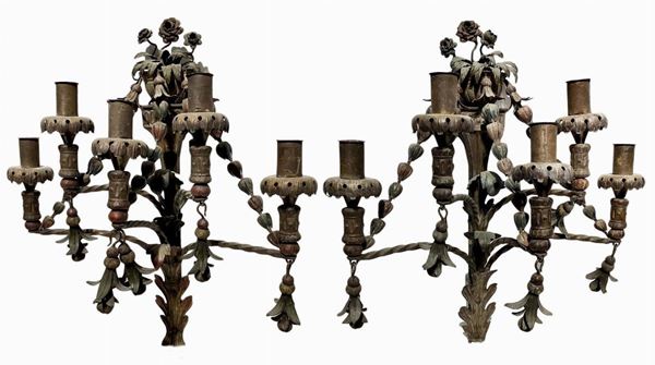 Pair of sheet metal appliques