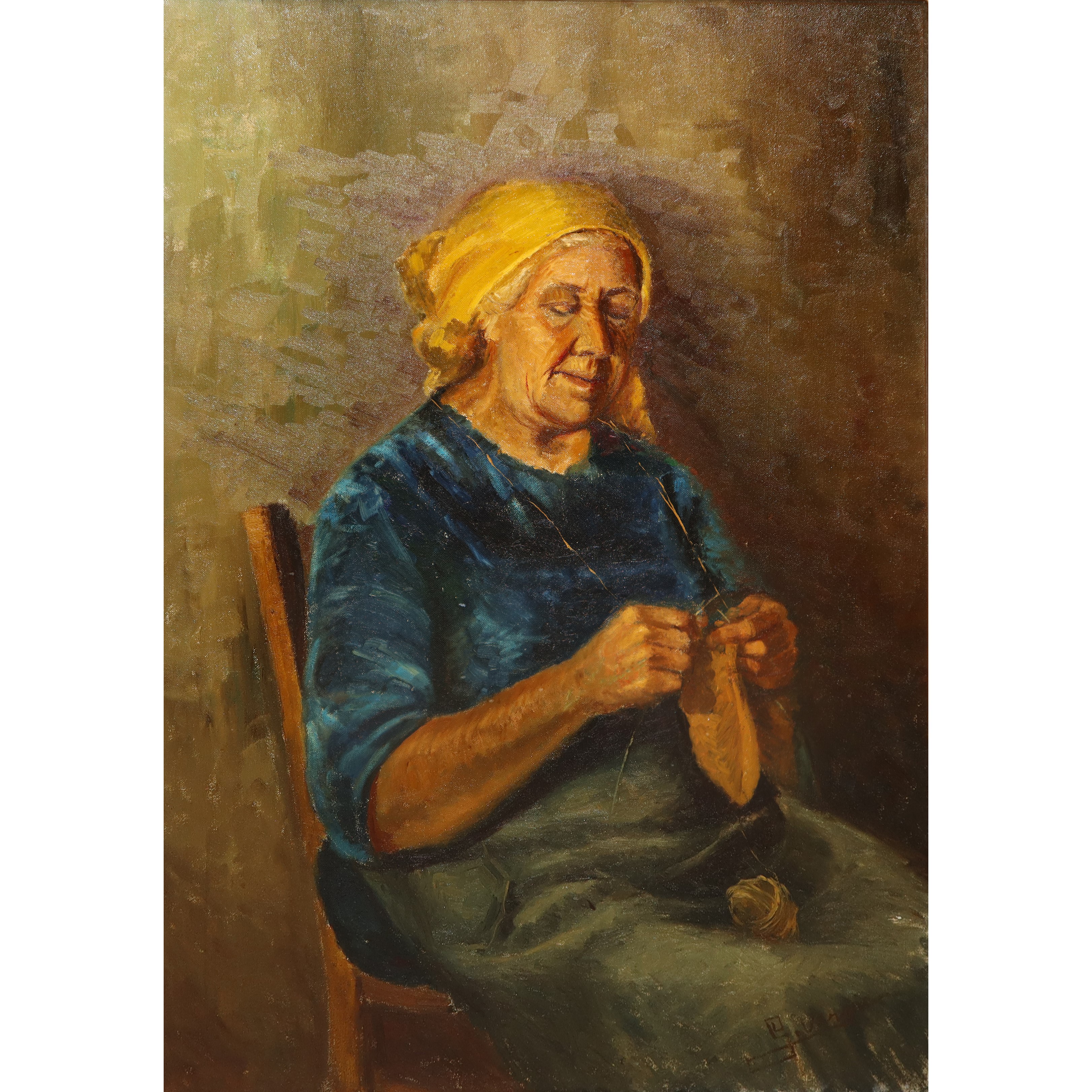 Donna che lavora ai ferri la lana