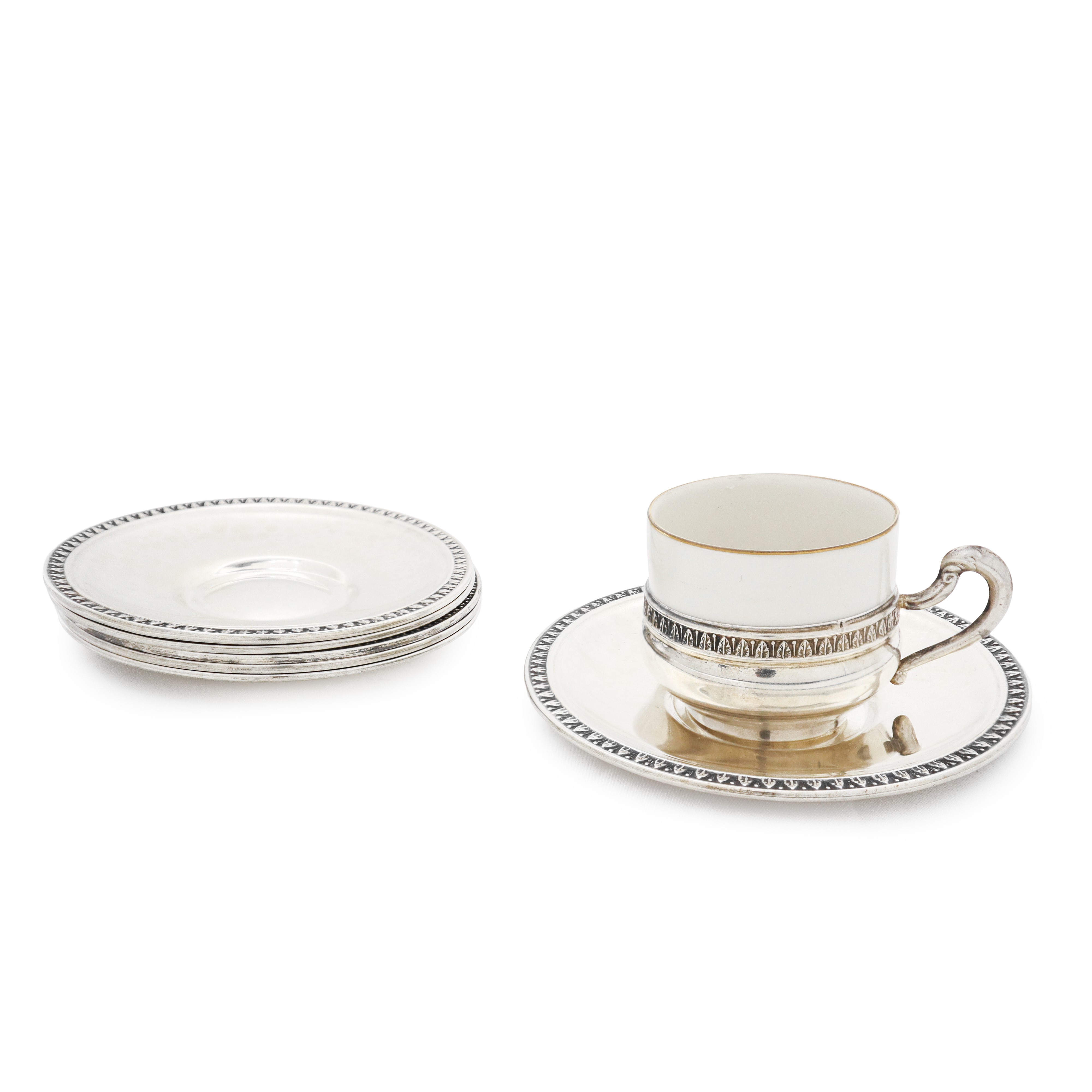 Servizio da caffè in argento 800 composto da 6 tazzine e piattini con interno in porcellana