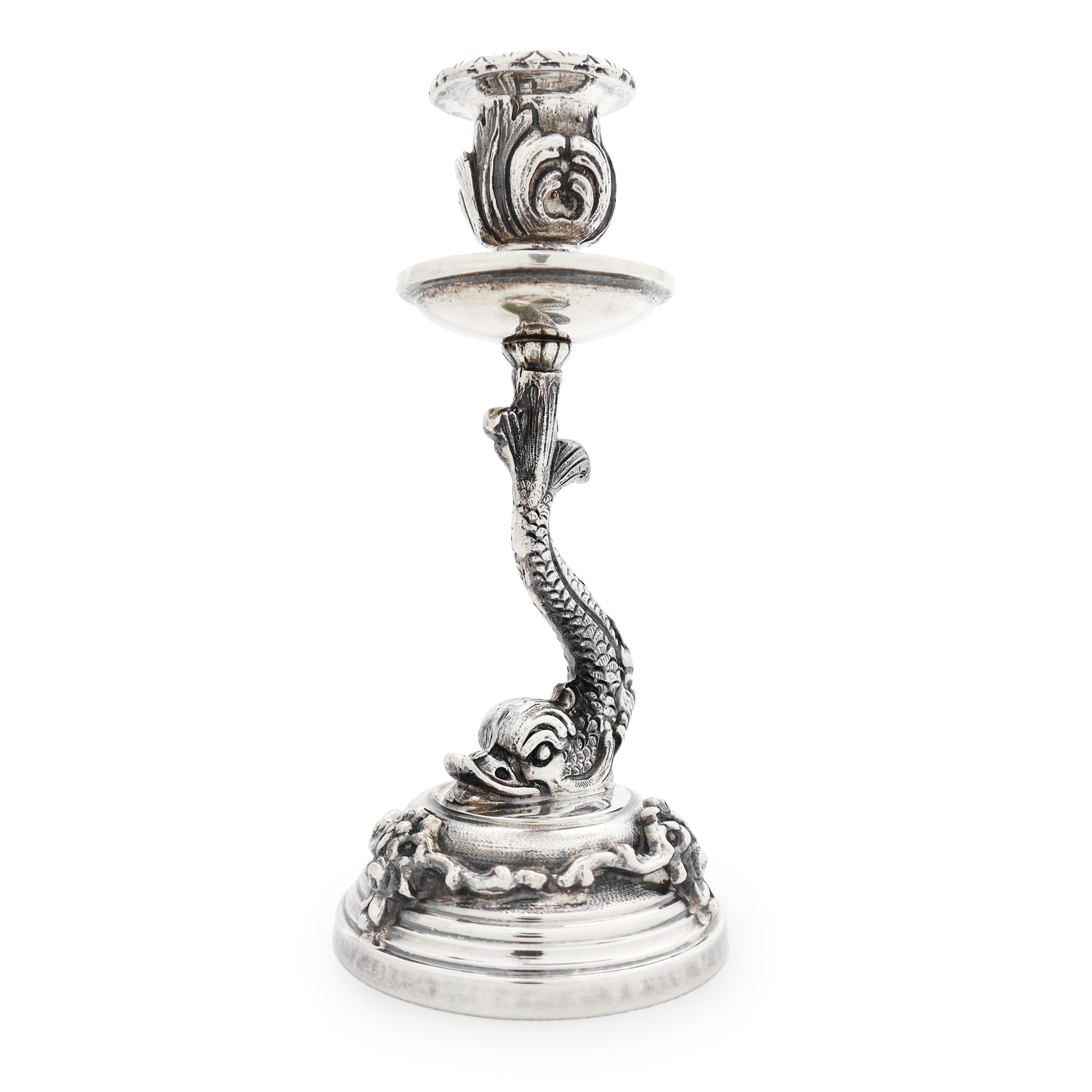 Coppia di candelieri monoforo con tritone alla base