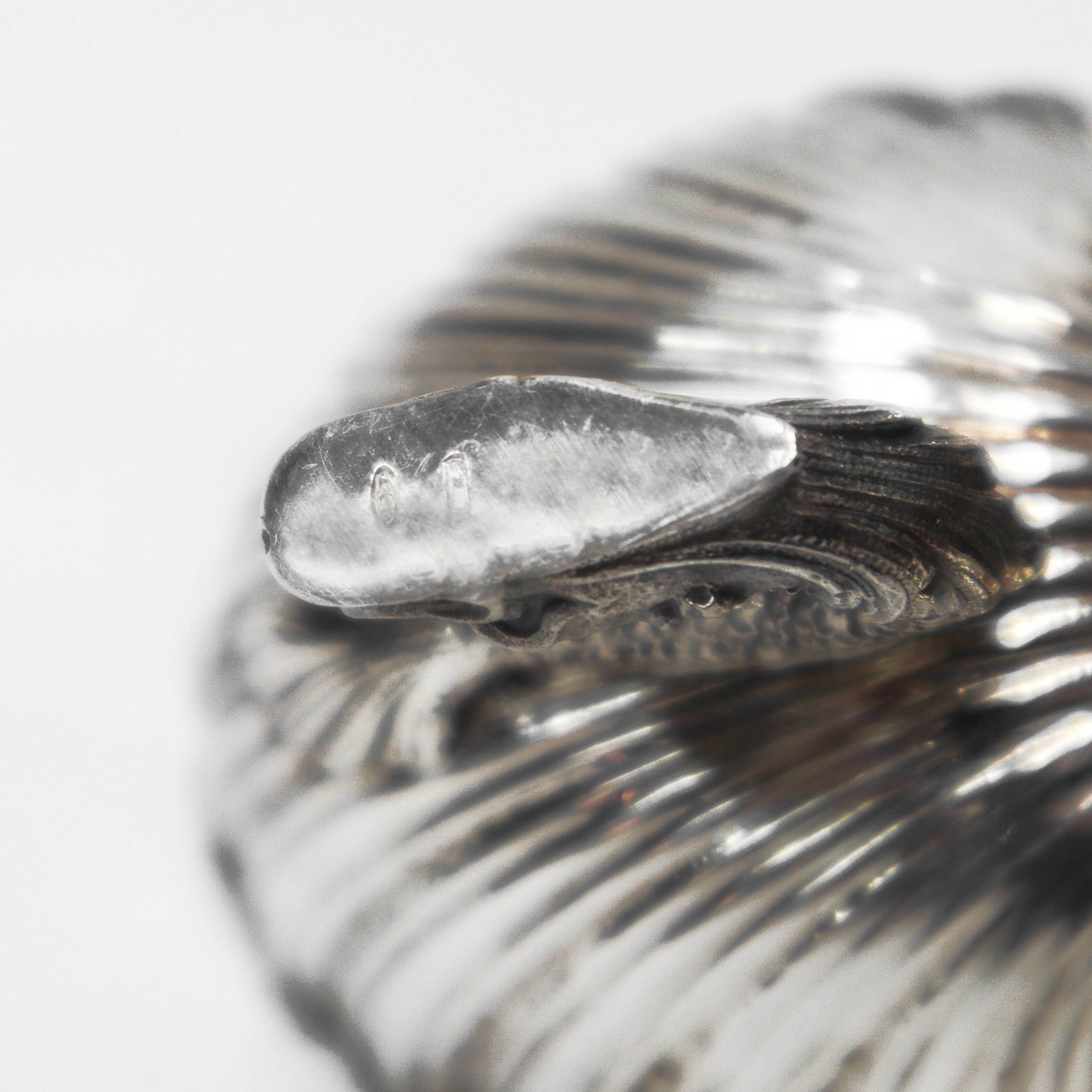 Saliera con cucchiaini con puttini in argento 800 e argento vermeille