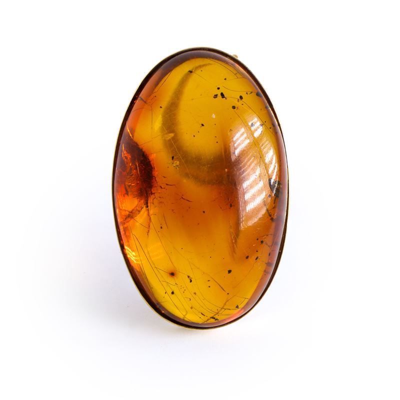 Spilla in oro giallo 750 e ambra