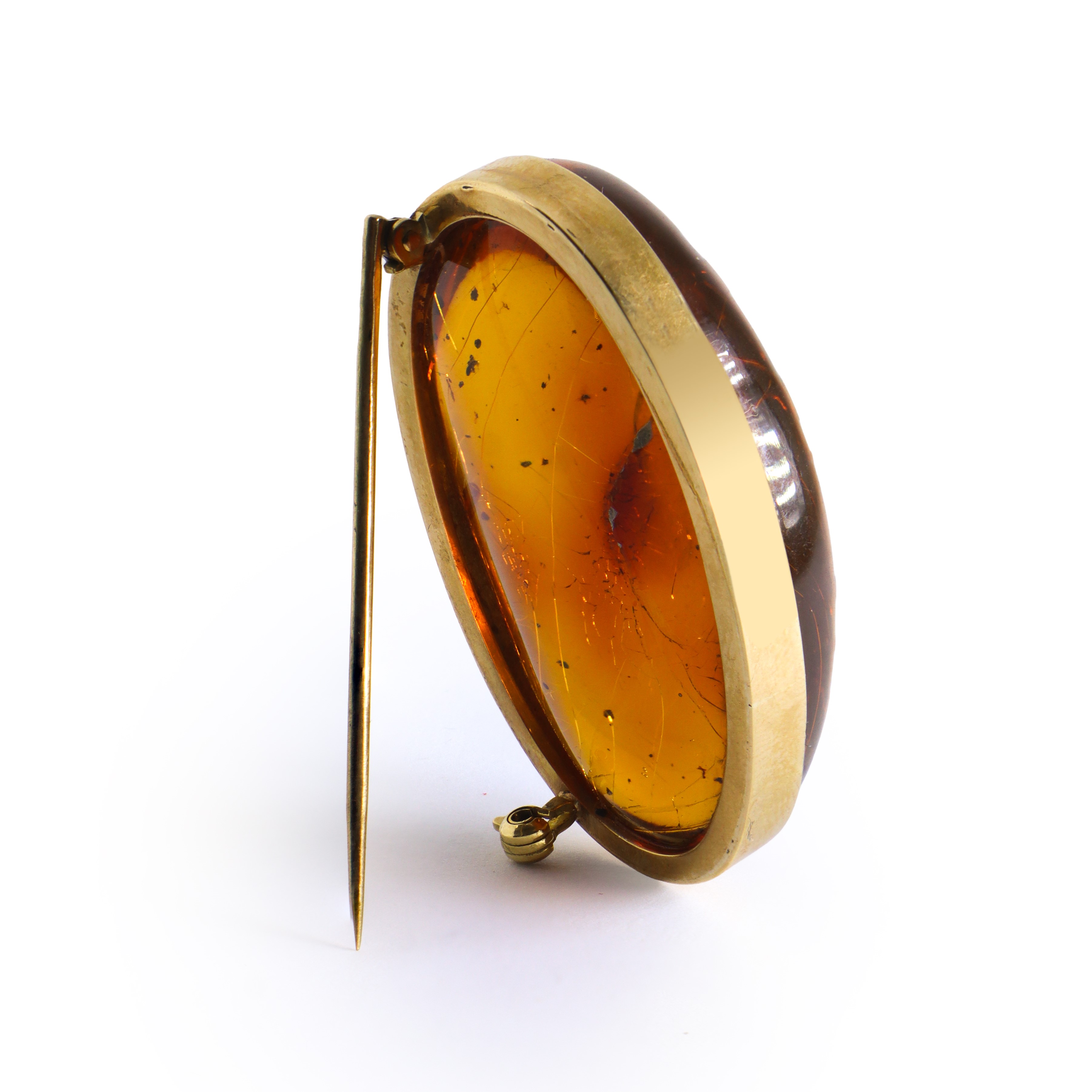 Spilla in oro giallo 750 e ambra