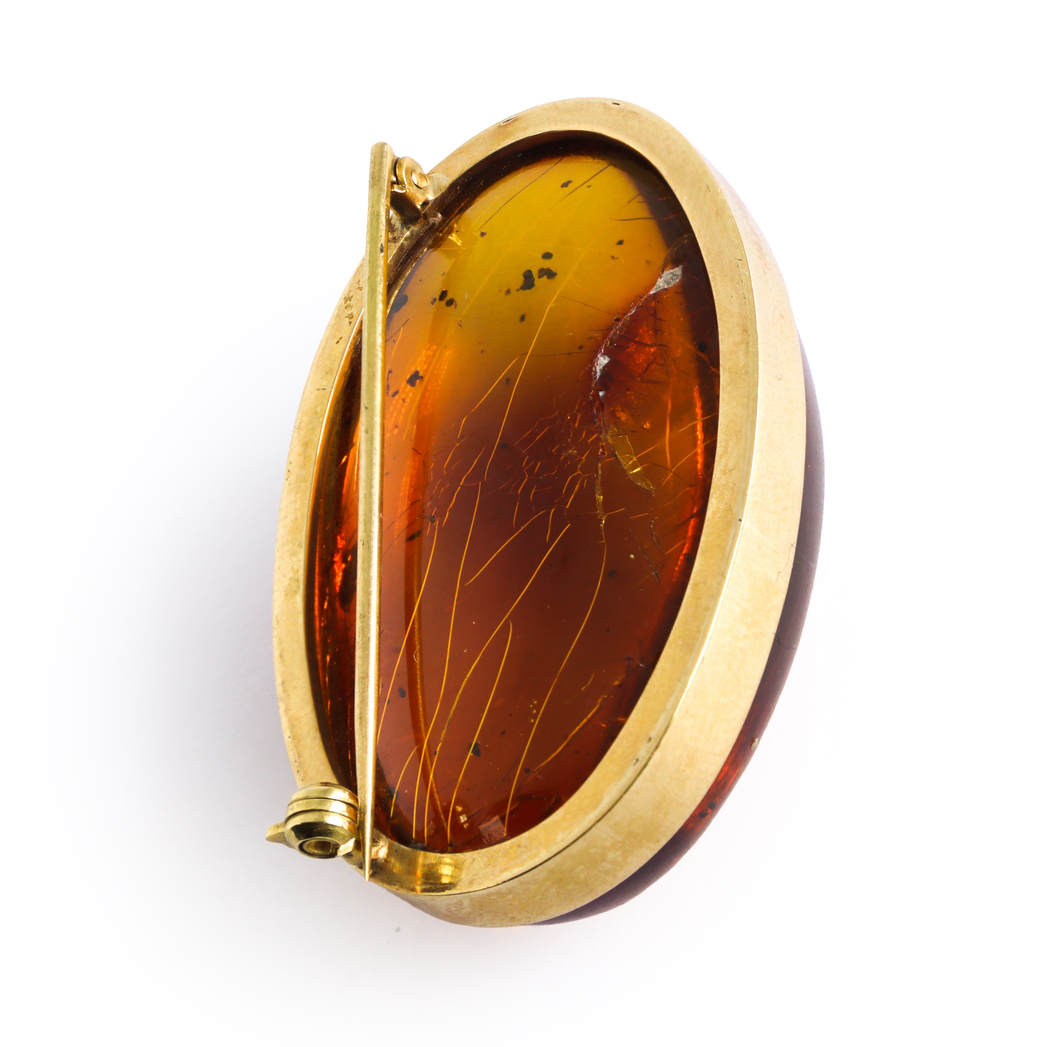 Spilla in oro giallo 750 e ambra
