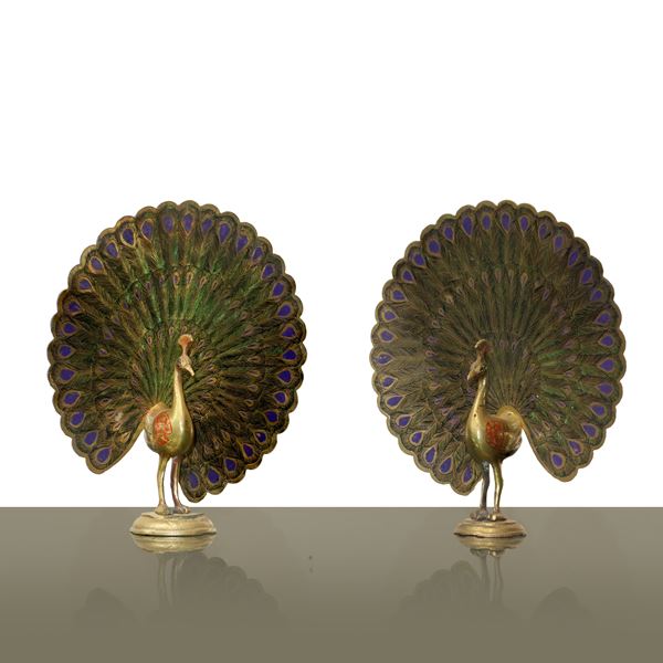 Pair of peacocks making a show in brass decorated with enamels