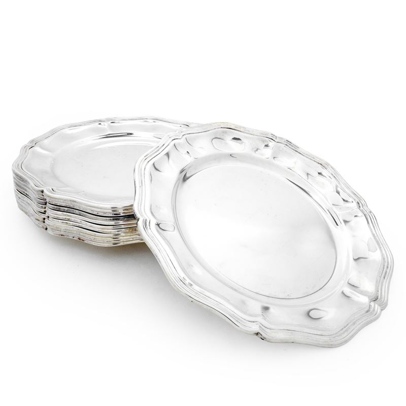 Servizio da 12 piattini in argento 800 con bordo smerlato