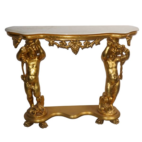 Consolle in legno dorato con piano in marmo bianco sorretto da due putti