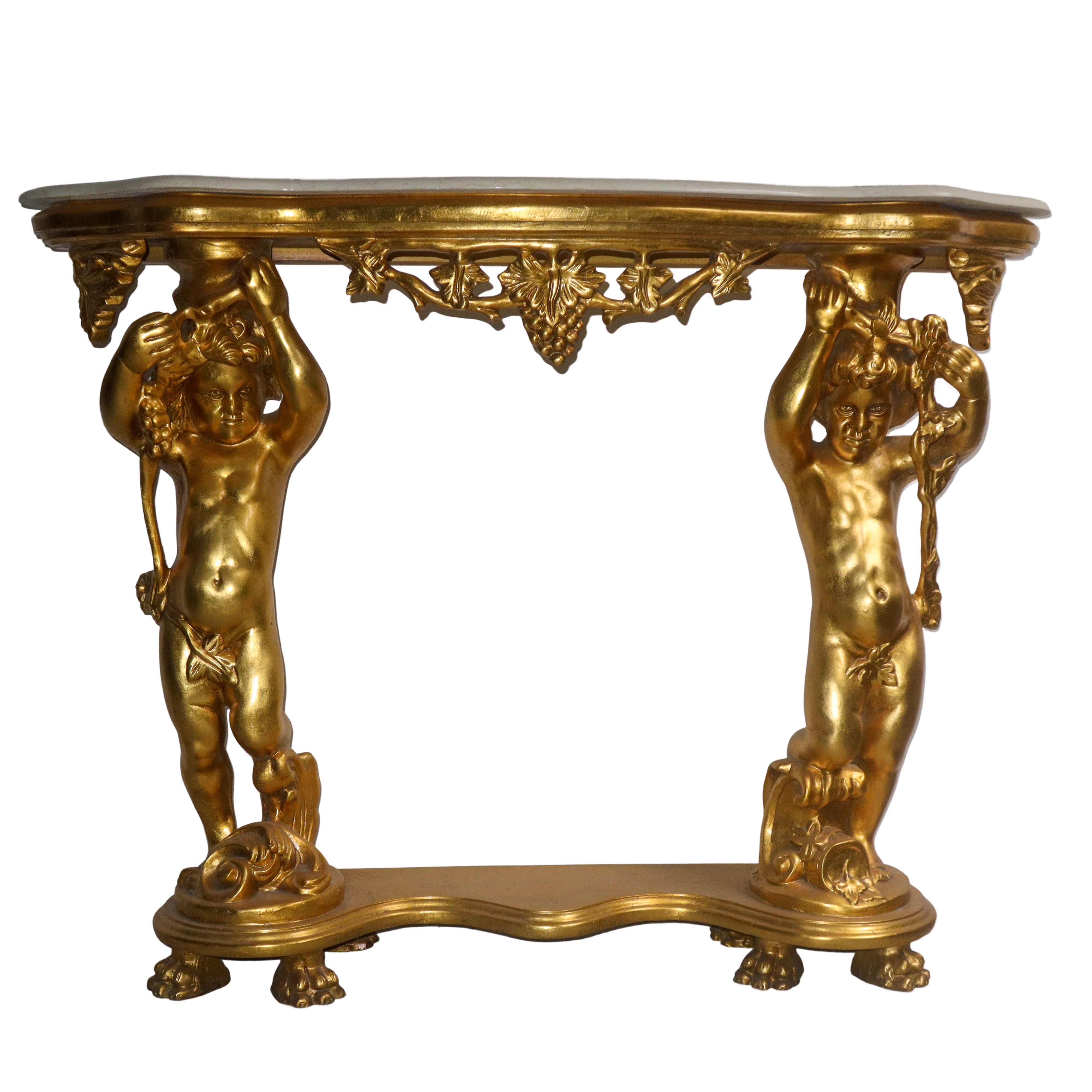 Consolle in legno dorato con piano in marmo bianco sorretto da due putti