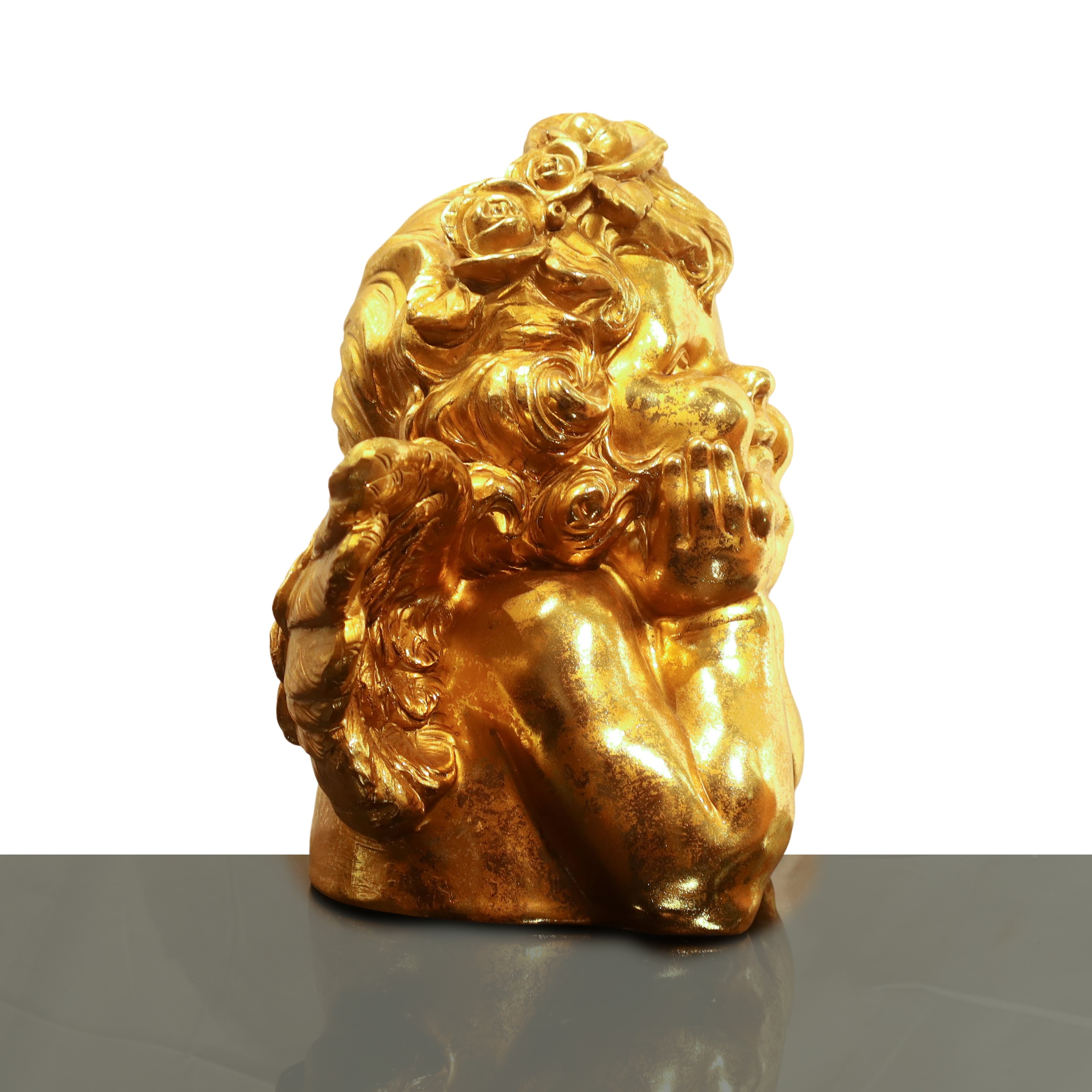 Puttino ornamentale dorato, figura in posizione pensante