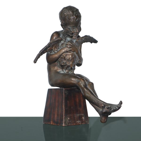 Boy with duck, brown patinated bronze sculpture