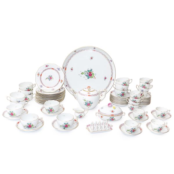 Herend  Hungary - Coffee and tea set "Apponyi" model in white porcelain with typical polychrome floral decoration on a white background, ozier edge and gold trim