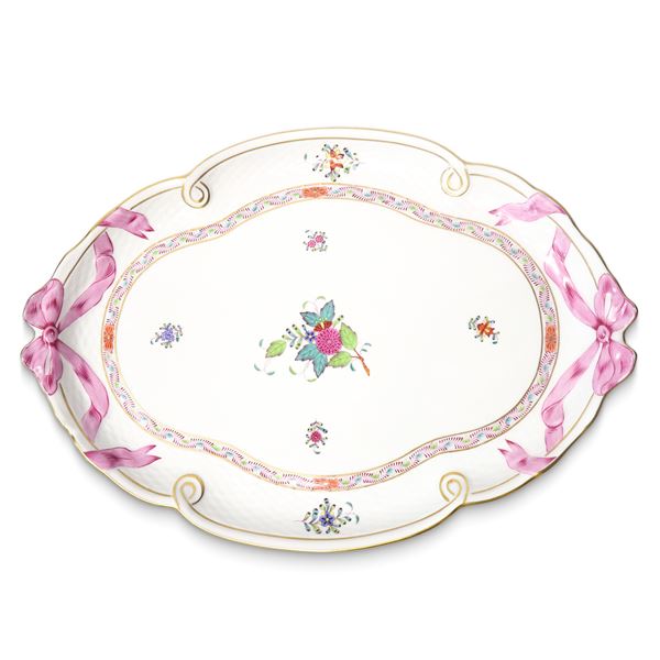 Herend  Hungary - "Apponyi" model tray in white porcelain with typical polychrome floral decoration on a white background and pink bows on the sides, ozier edge and gold trim