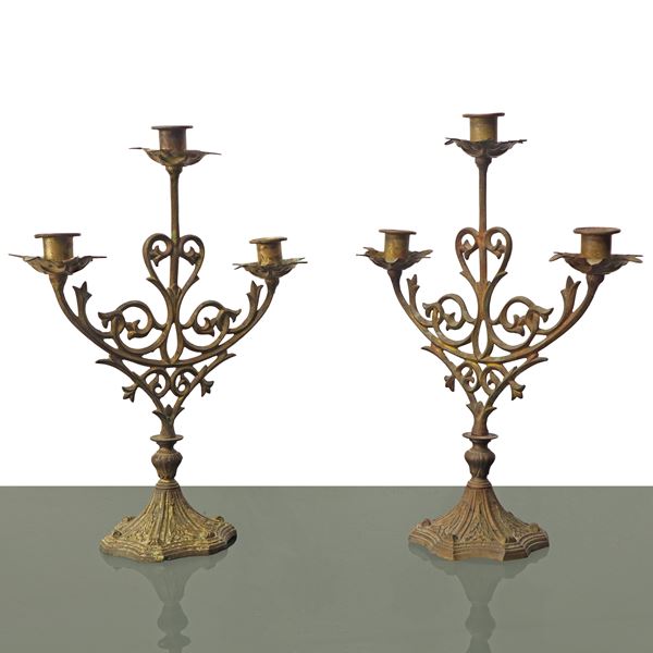 Pair of three-light metal candelabras