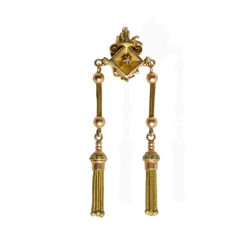 Ciondolo in oro con corona e pendenti