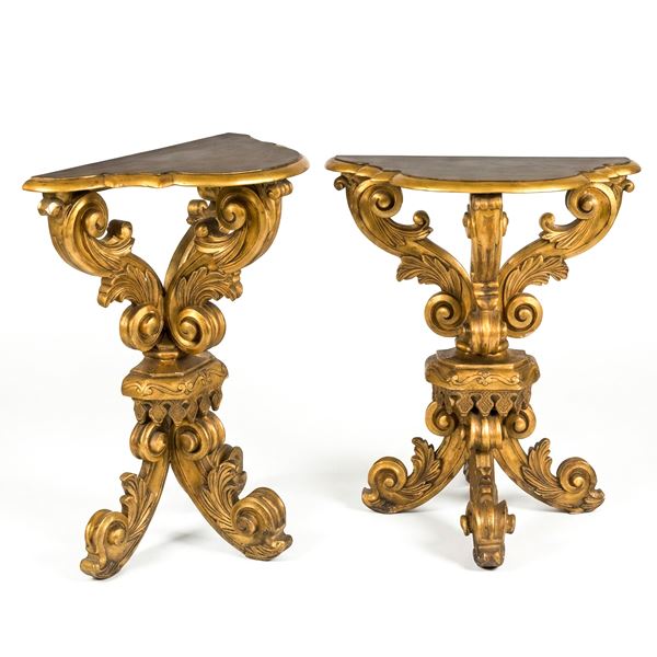 Pair of small gilded wooden console tables