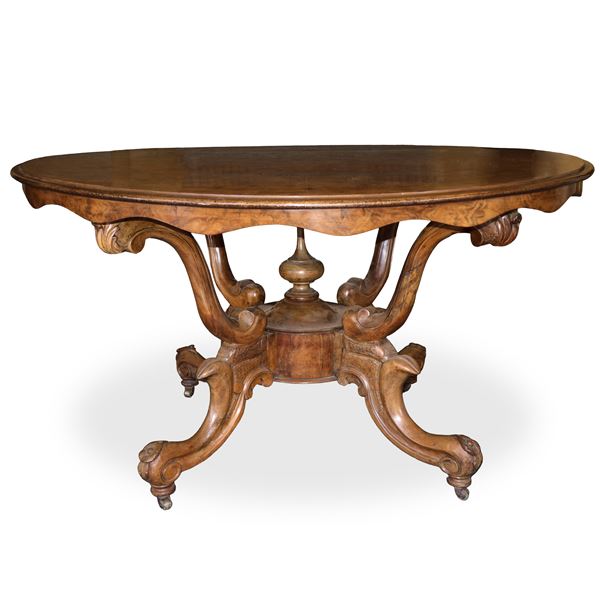 Basket table with scalloped undertop with 4-star base and central bulb with wheels