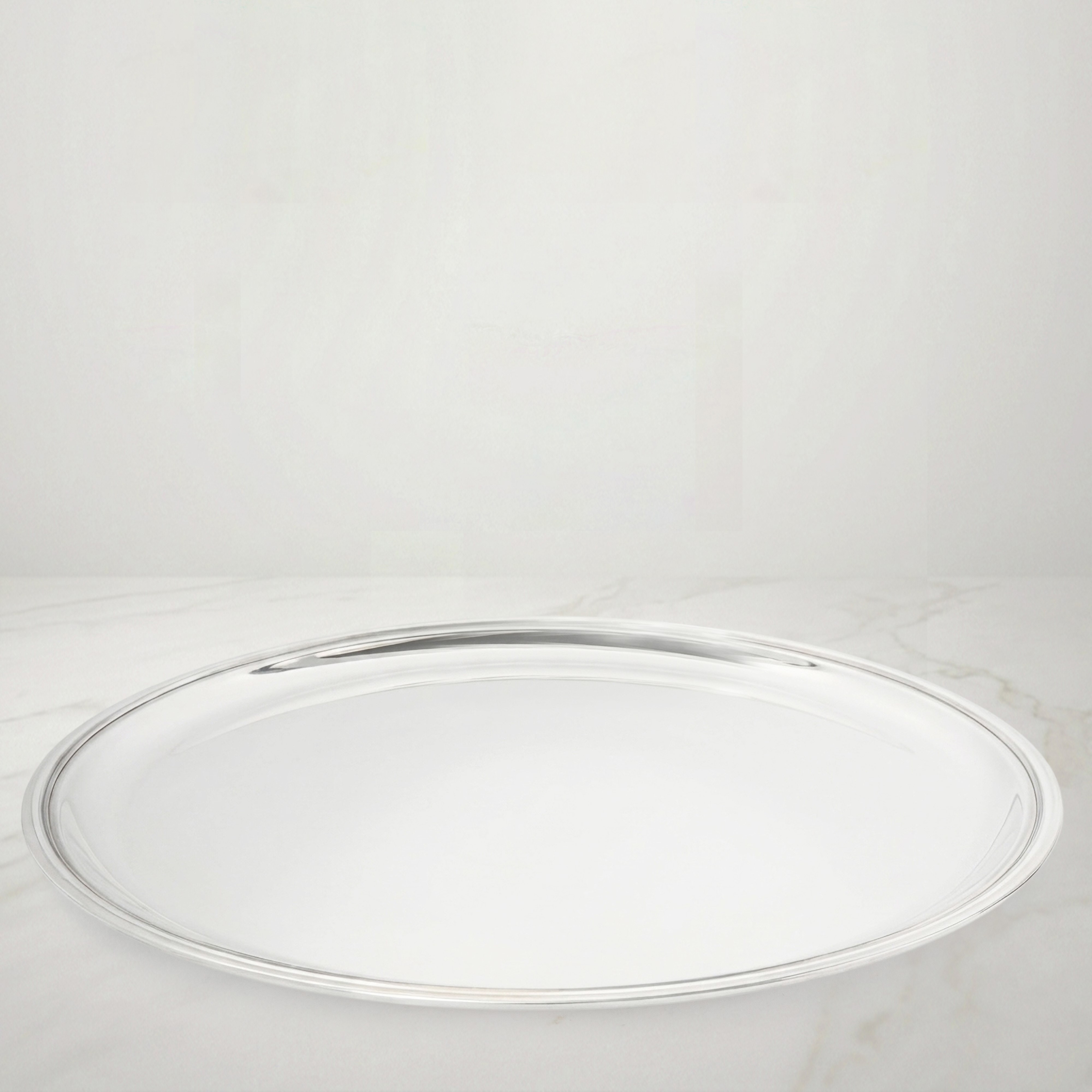 Piatto rotondo in argento 800