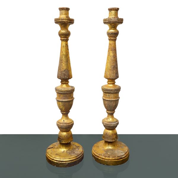 Pair of gilded, silver and Mecca wooden candlesticks