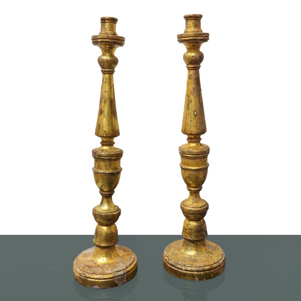 Pair of gilded, silver and Mecca wooden candlesticks