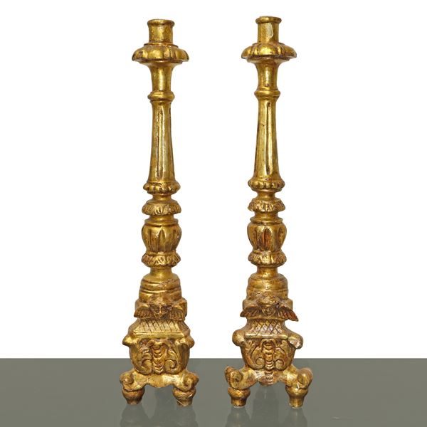 Pair of candlesticks with Mecca-shaped end