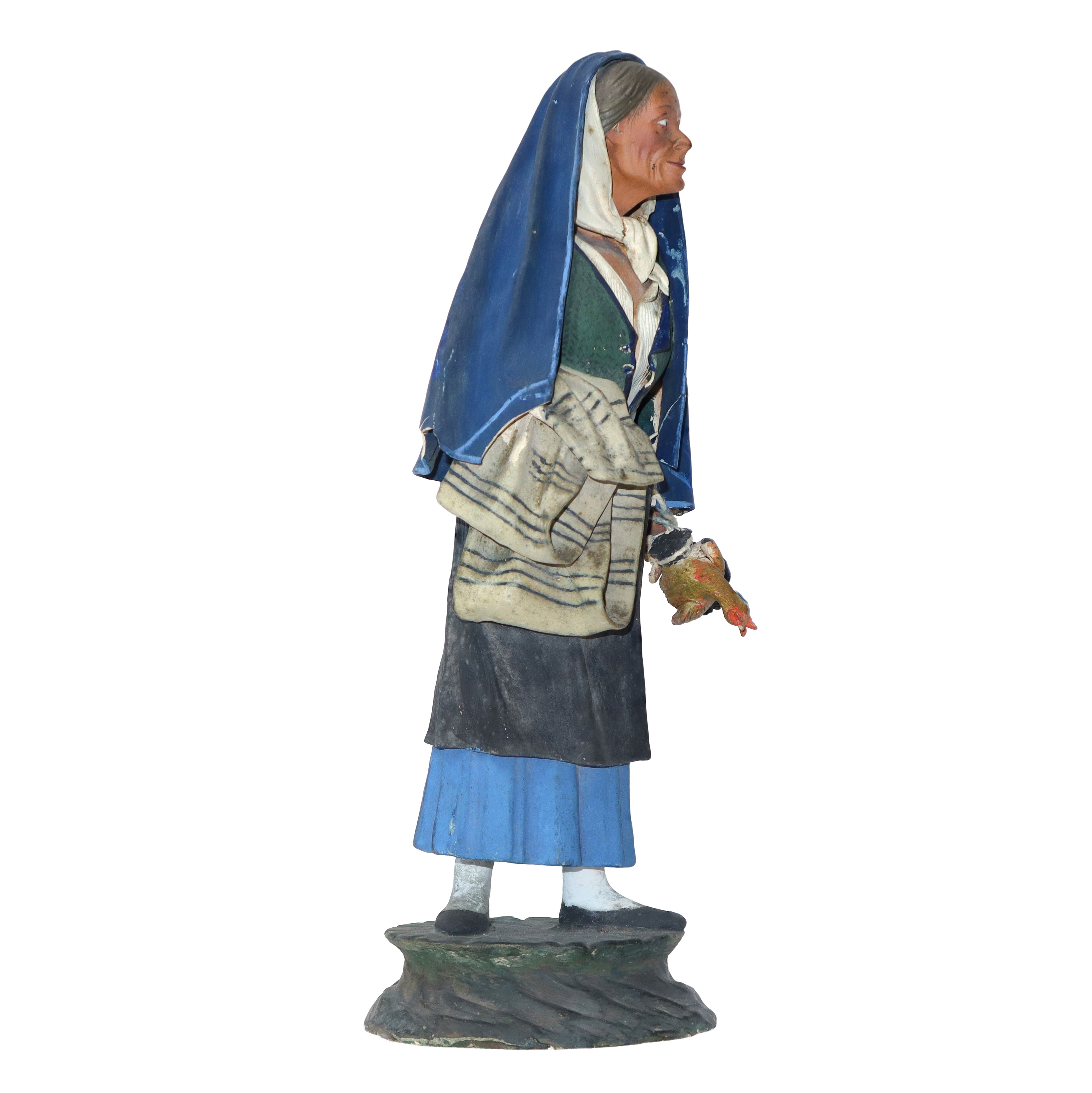 Gruppo di n. 3 figurine in terracotta di Caltagirone raffiguranti Contadini in teca di legno