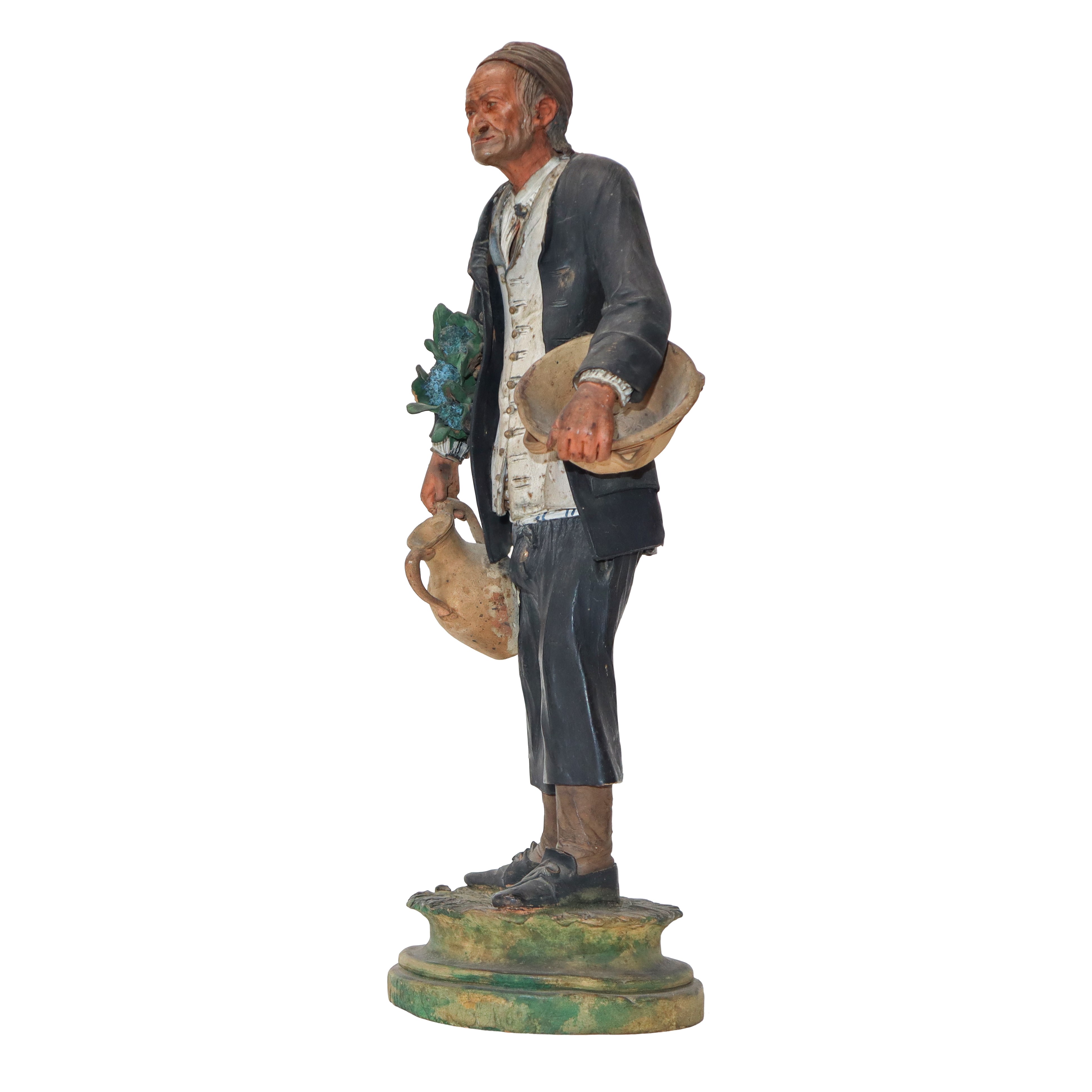 Gruppo di n. 3 figurine in terracotta di Caltagirone raffiguranti Contadini in teca di legno