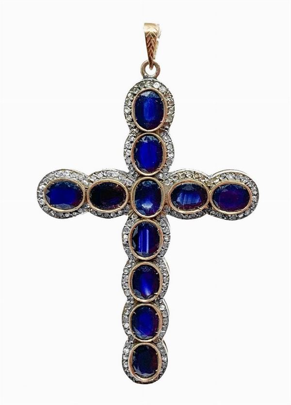 Gold Cross 9 K and silver with blue sapphires and diamonds rose cut. Gr 15.5