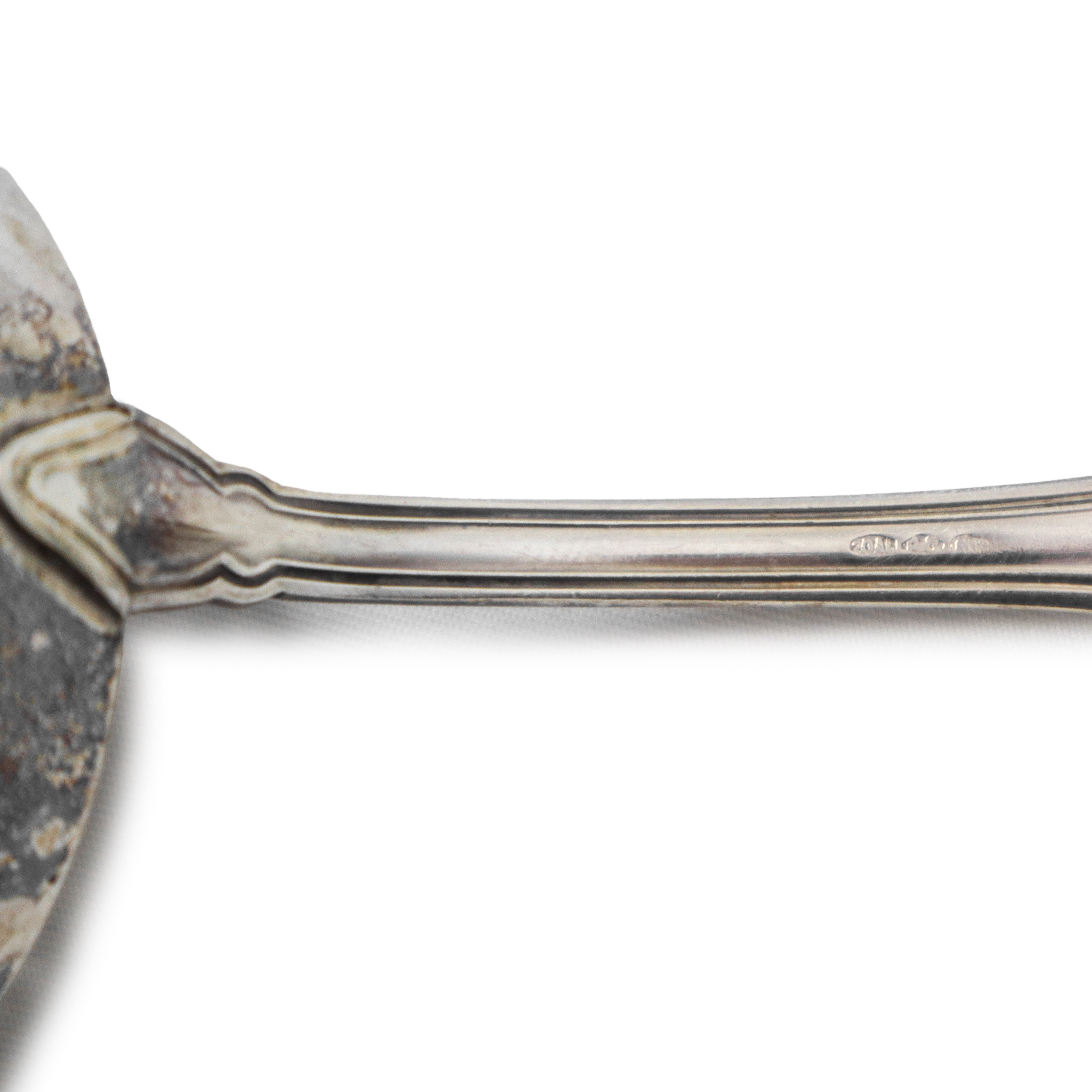 Spargizucchero in argento 800
