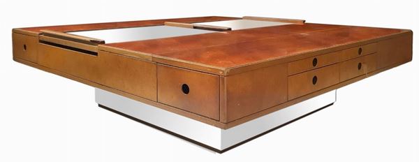 Italian Production attributable Guido Faleschini. Mobile Low wooden covered in briar. Doors covered in Alcantara in shades of beige. Details polished aluminum. Wear and tear along the floor and doors. H cm 40 x 130 x 130. Wear and tear